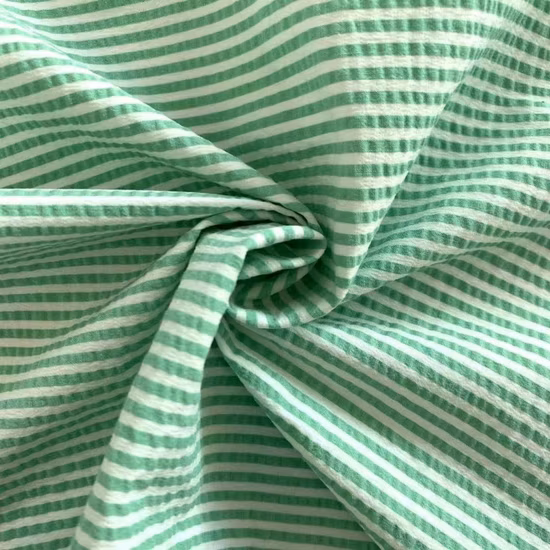 より多くの人が 115GSM 固体染めテーブルクレープ生地布 100 ポリエステルを選択します。